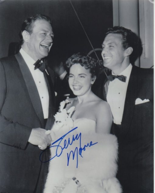 Terry Moore with John Wayne and Robert Stack